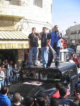 G-Town performing on top of the Hummer, East Jerusalem, February 2007