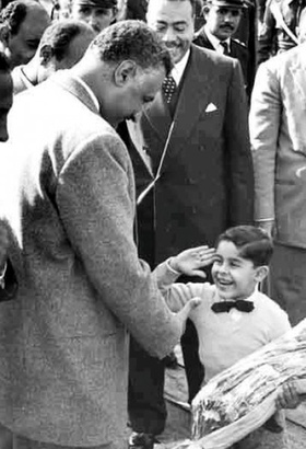Sisi as a child saluting Nasser, 1960. Screenshot by the author, image taken from http://www.egyptiansnews.com/News2-8158.html, provenance unknown. ‘In the photo, Al Sisi is just a little boy of maybe 4 or 5 years old, he is saluting Jamal Abdel Nasser and getting ready to hand him a bouquet of flowers during celebration of the Anniversary of July 23rd revolution.’ Sami Mubayed, ‘The Ghost of Gamal Abdul Nasser,’ The Huffington Post, 30 July, 2013: http://www.huffingtonpost.com/sami-moubayed/the-ghost-of-gamal-abdul-_b_3667639.html