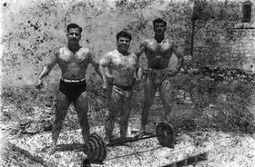 Akram Zaatari, Bodybuilders, Printed From A Damaged Negative Showing From Left To Right: Hassan El Aakkad, Munir El Dada And Mahmoud El Dimassy In Saida, 1948, 2011. Inkjet print. 180 x 145 cm. 70 7/8 x 57 1/8 in.