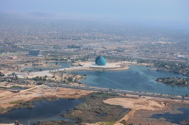Aerial site photo, Palestine Street, Baghdad, al-Shaheed Martyrs Monument in background.