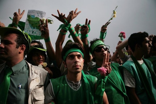 <p>Newsha Tavakolian, 2011</p><p>Photograph</p><p>Courtesy of the artist</p><p>Â </p><p>10: Supporters of Mir-Hossein Mousavi, the main challenger of incumbent President Ahmadinejad, during a rally in which they formed a human chain along Tehran's main artery, the 12-mile-long Vali-e Asr street. They dress in green as this is chosen as the signature colour for Mousavi.</p> 