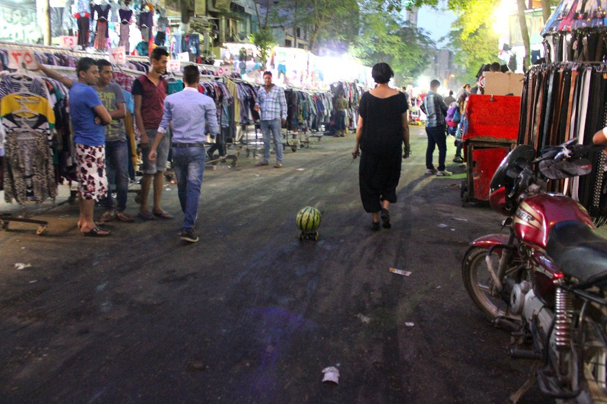 Heba Amin, Walking the Watermelon in Cairo, public performance.