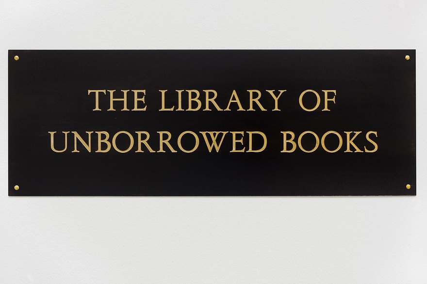 Meriç Algun Ringborg, The Library of Unborrowed Books, 2012. Site-specific installation with books, shelves, brass sign, two contracts. Section I: Stockholms Stadsbibliotek (Stockholm Public Library), 2012 at Konstakademien, Stockholm.