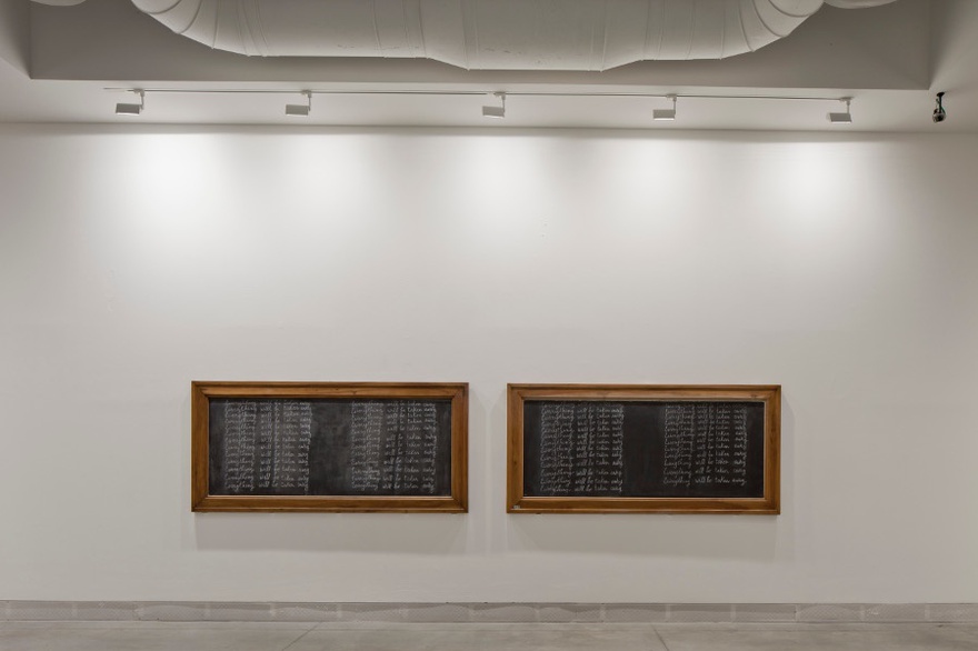 Adrian Piper, Everything 21, 2010-2013. Four boards in vintage picture frames with lacquered wood, each mounted on a wall at eye level, oriented horizontally and covered with a single phrase handwritten in cursive, in white chalk and repeated 25 times. 120 x 250 cm each. 56th International Art Exhibition - la Biennale di Venezia, All the World’s Futures.