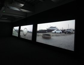 Nevin Aladağ, Session, 2013, three-channel HD colour video projection with sound. Commissioned by Sharjah Art Foundation. Image courtesy of Sharjah Art Foundation.