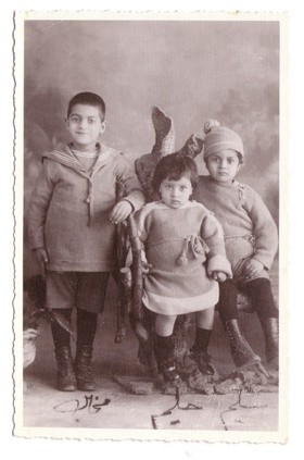 Michael, Halim (center), Selim as babies.