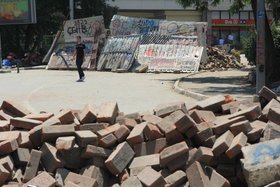 There were close to 15 barricades lined up on Inonu Street in Gumussuyu, one of the main avenues leading into Taksim Square.