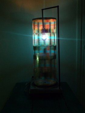Shezad Dawood, Recyclage (V), 2011, vintage record player, cut metal drum & light bulb, 69 x 50 x 35 cm. Installation view at L'appartement 22, Rabat. Courtesy of the artist.