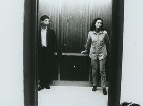 Caveh Zahedi meets Erin McKim in an elevator in A Little Stiff, 1991. Courtesy of the artist.