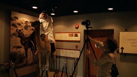Caveh Zahedi, Mounting a Museum Camel without permission, still from The Sheik and I, 2012. Courtesy of the artist.