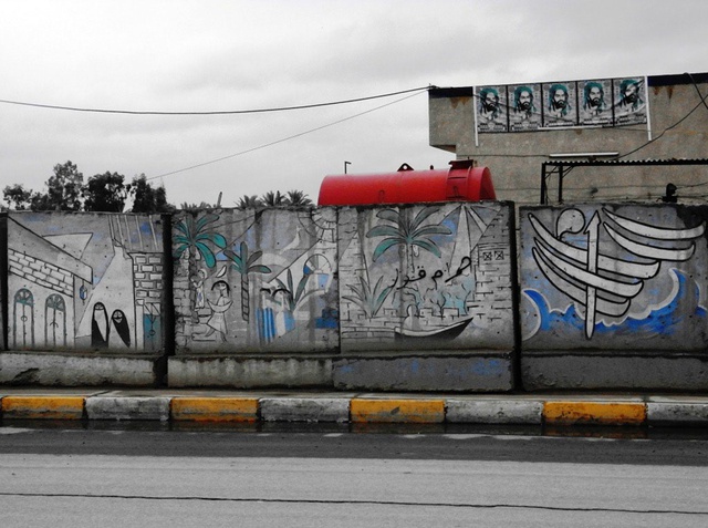 Sadr City, this mural displays human silhouettes in the style of the Iraqi pioneer Jawad Saleem