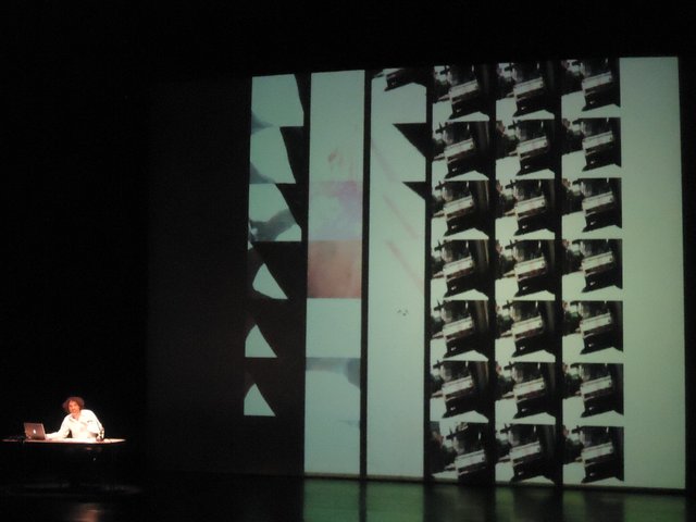 Rabih Mroué performing The Pixelated Revolution, Staatstheatre, Kassel, Documenta 13, June 7, 2012.Copyright: ATP/Ibraaz Publishing, 2012.