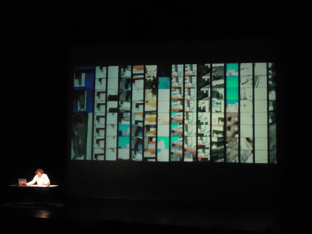 Rabih Mroué performing The Pixelated Revolution, Staatstheatre, Kassel, Documenta 13, June 7, 2012.Copyright: ATP/Ibraaz Publishing, 2012.