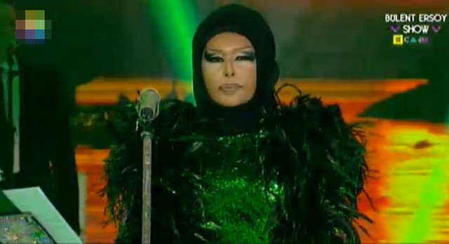 Screengrab of Turkish transvestite Bulent Ersoy with her Islamic dress.
