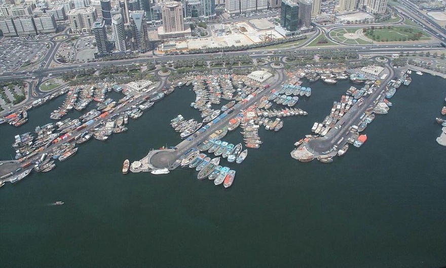 Aerial view of Port Saeed in Deira. Aladdin City's towers are proposed above its three piers.