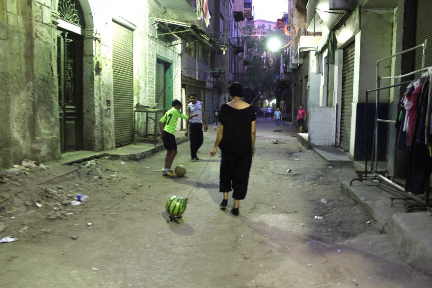 Heba Amin, Walking the Watermelon in Cairo, public performance.