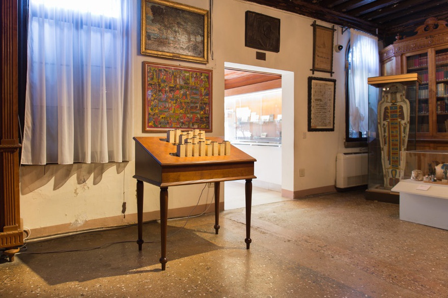 Hera Büyüktaşcıyan, Letters from Lost Paradise, 2015. Mechanism, bronze, wood. 64 x 100 x 85-90 cm (front), 110-115 cm (back). Installation view, Mekhitarist Monastery of San Lazzaro degli Armeni, Venice.