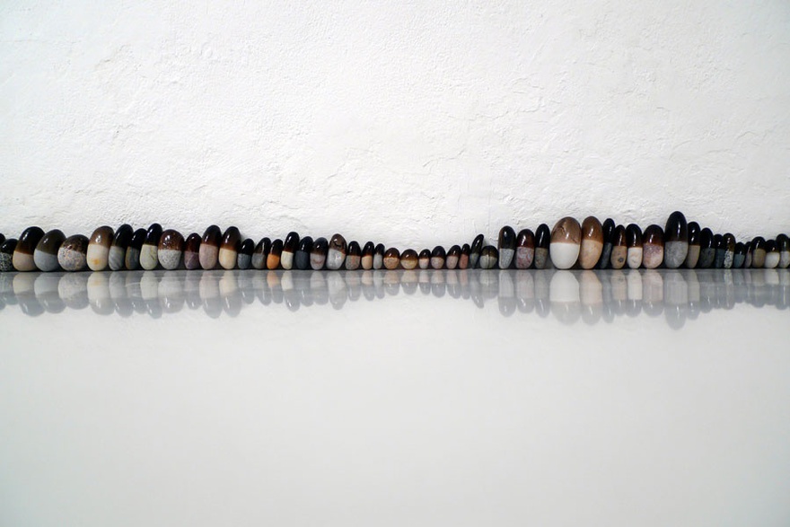 Nida Sinnokrot, Rubber-Coated Rocks (Horizon No. 2), 2009, (detail), stone, rubber, 600 cm.