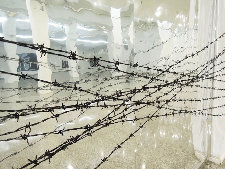 Walid Siti, Silver Lining (detail), 2013. Wall based installtion , mylar mirror & barbed wire, 245 cm x 1500 cm.