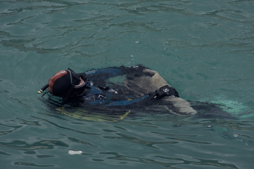 Diver Alessandro Rignani Lolli with found sculpture.