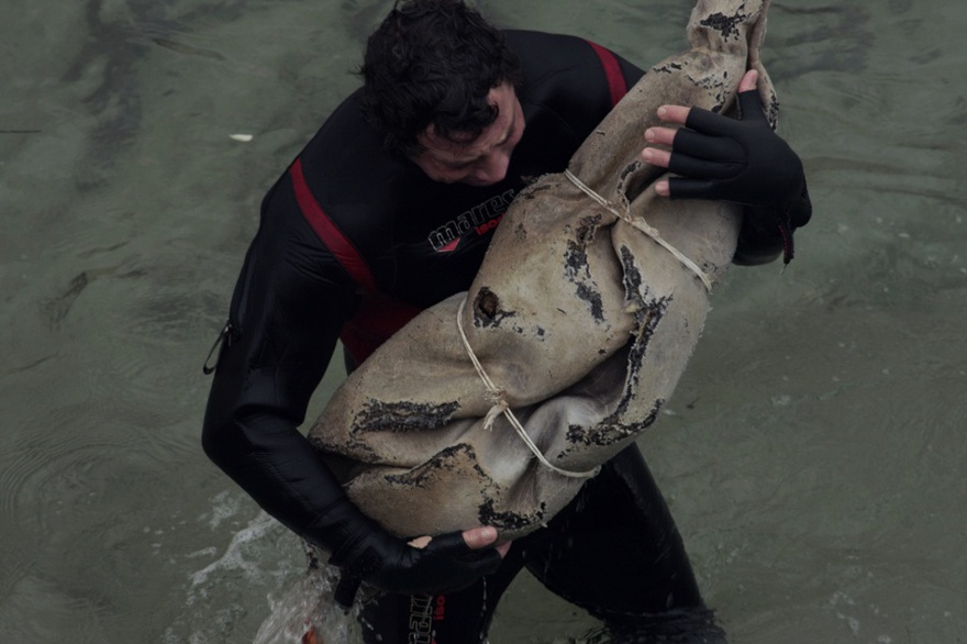 Diver Alessandro Rignani Lolli with found sculpture.