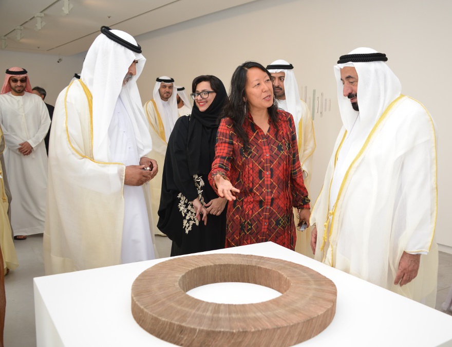 HH Sheikh Dr. Sultan bin Mohammed Al Qasimi, HE Sheikha Hoor Al Qasimi and SB12 curator Eungie Joo at the opening of Sharjah Biennial 12, 2015.